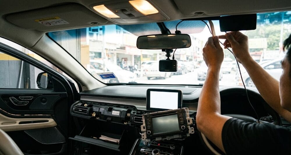 Car accessories installation workshop fitting a dash cam and audio system in Malaysia - Service Pro Automotive Hub open territory